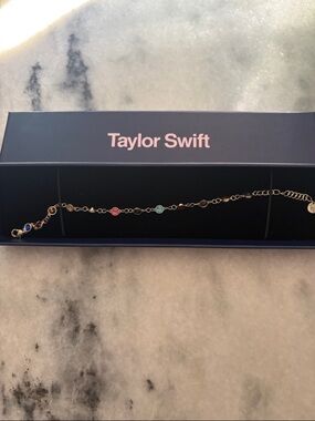 Taylor Swift Gold-Tone Bracelet with multi color Stones